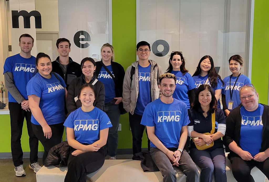 KPMG Corporate Volunteers inside San Francisco SPCA Adoption Center
